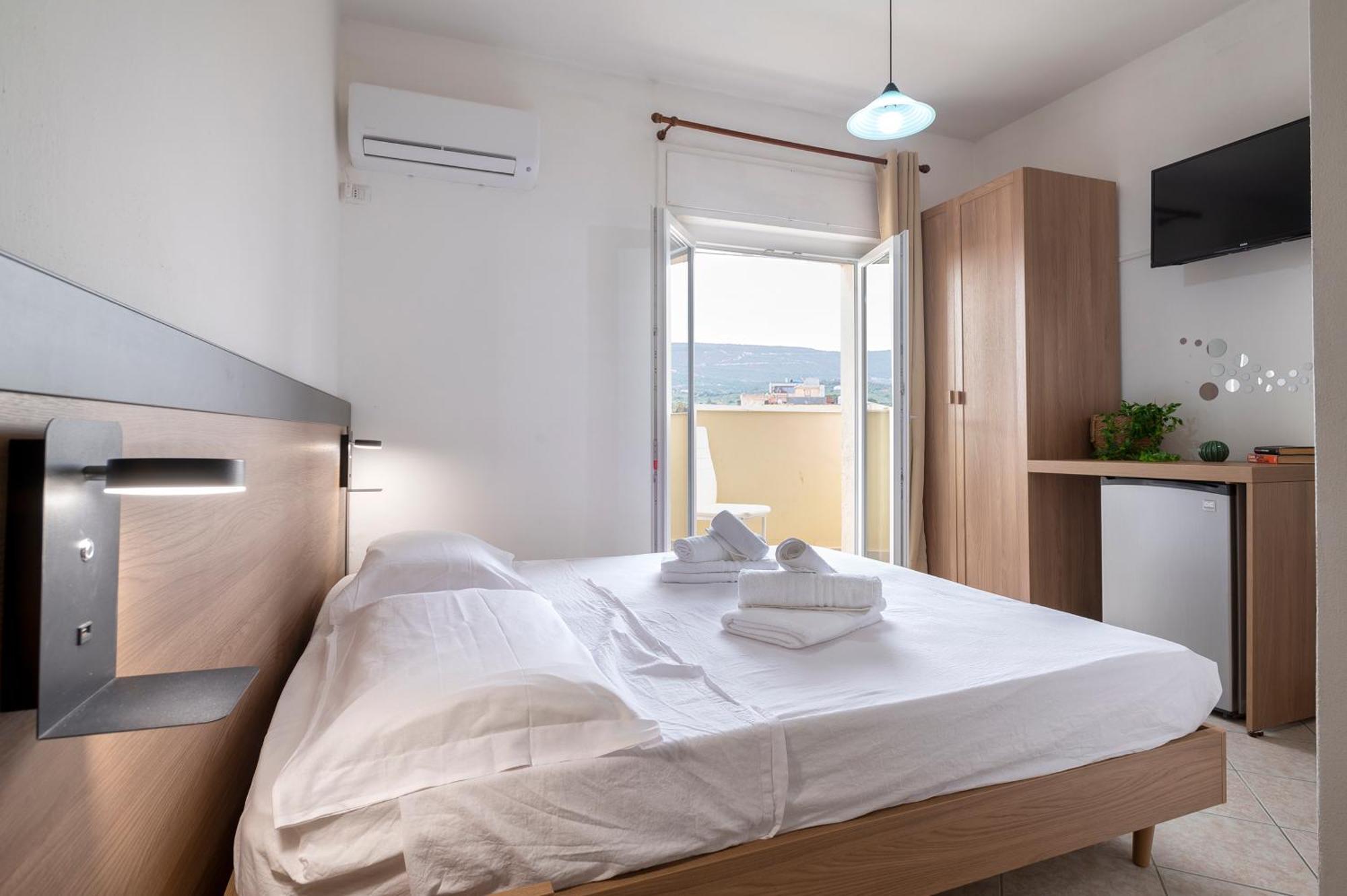 Oasis Guest House Альгеро Екстер'єр фото